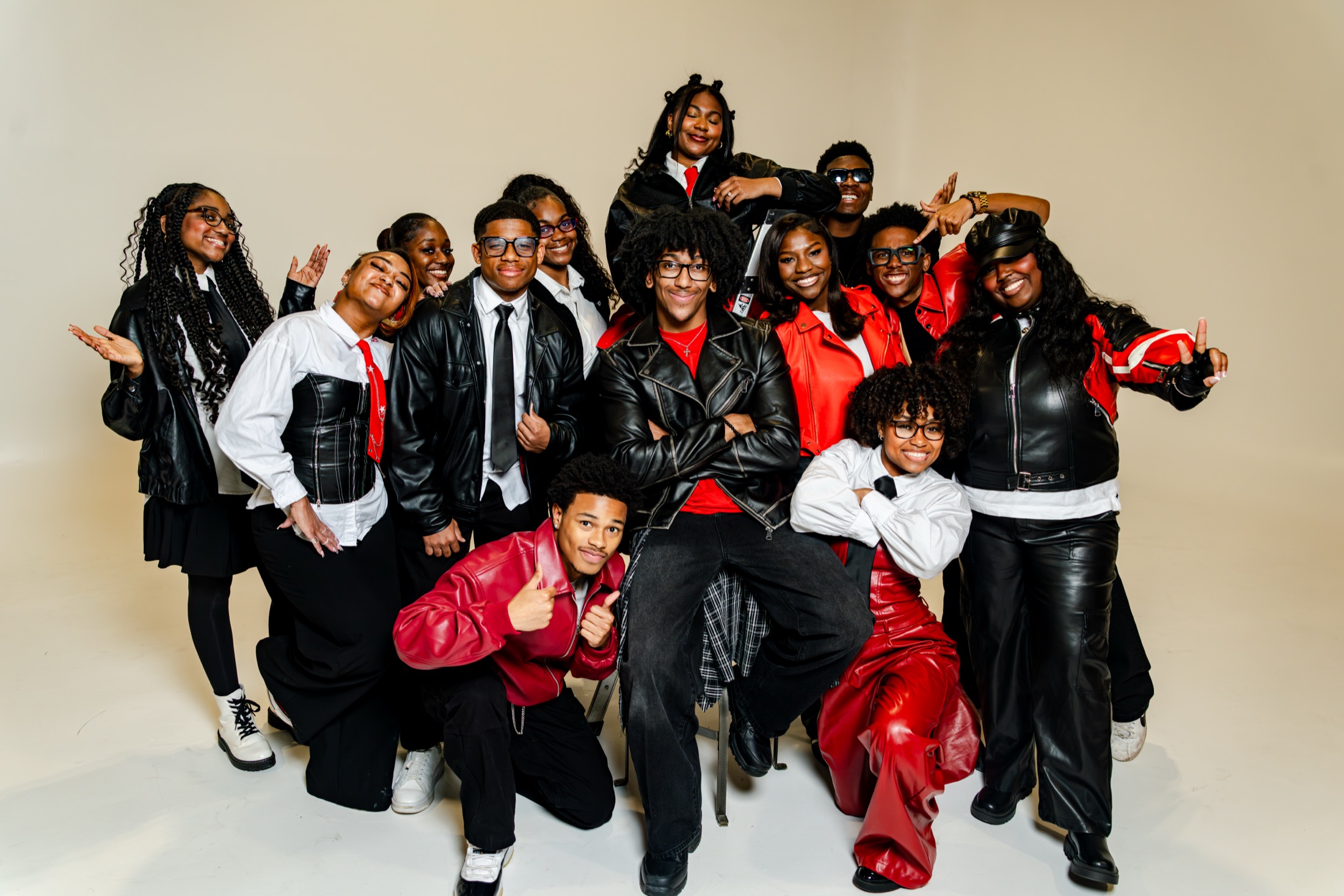 Ablaze Youth Choir ensemble, studio portrait in red and black